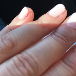 Mystic Nail - She ripped my pinky nail up and it's bloody. Wtf. The lady was lazy and put 12 layers on, then "cut off" the rest including my skin!!