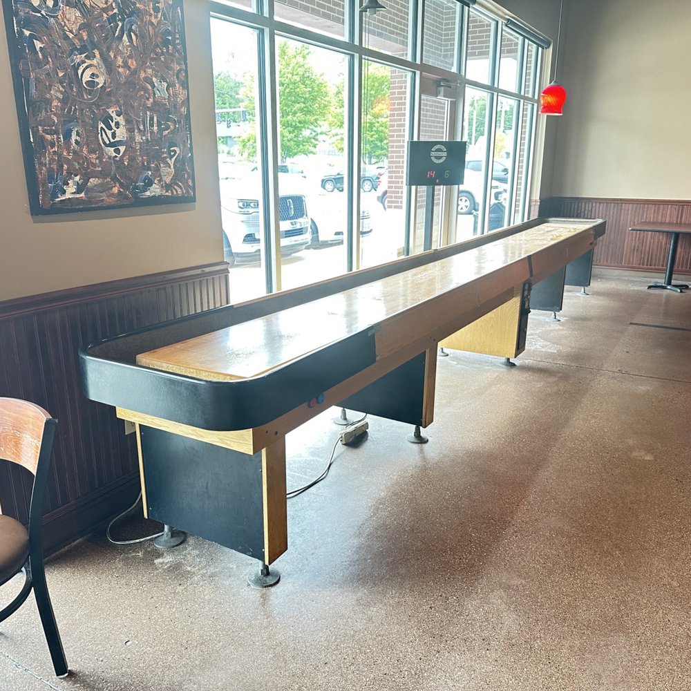 Jimi D'S - The shuffleboard table and dart board - Italian Near Me - Omaha, Nebraska Jimi D'S - The shuffleboard table and dart board - Italian Near Me - Omaha, Nebraska