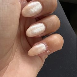 Attractive Nails & Spa - All nails different shapes, cuticles messy, paint on skin, paint doesn't even start at cuticle.
