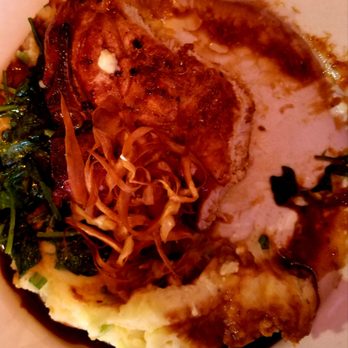 The Druid - Half of a giant pork chop - Irish Pub Near Me - Cambridge, Massachusetts