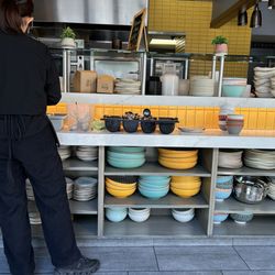 My seating arrangement listening to plates, silverware clanking, stacking, no ambiance for a quiet lunch