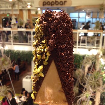 Popbar - almond with dark chocolate and chocolate sprinkles on one side, caramel and pistachio on the other side - Desserts Near Me - Anaheim, California