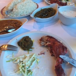 Tandoori chicken, beef curry, raita and saag. Yum!