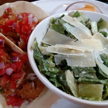 Bahama Breeze - Lunch portion coconut shrimp tacos with Caesar salad - Bars Near Me - Gainesville, Florida