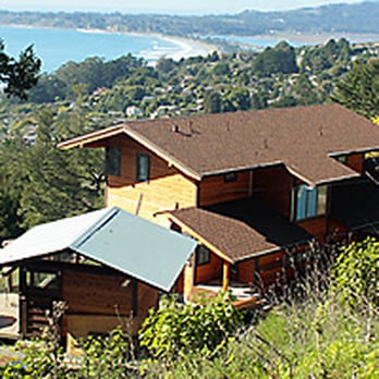 Vida Building Systems - New home with attached carport and detached studio built on three-plus acres in the Highlands, Stinson Beach. - General Contractors Near Me