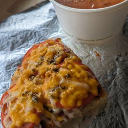 Bella Crusta - Slice of cheese pizza and tomato basil souy