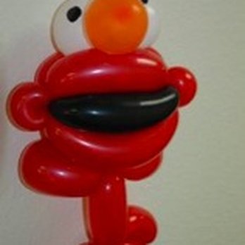 Party Animals - red monster balloon creation - Party Characters Near Me Party Animals - red monster balloon creation - Party Characters Near Me