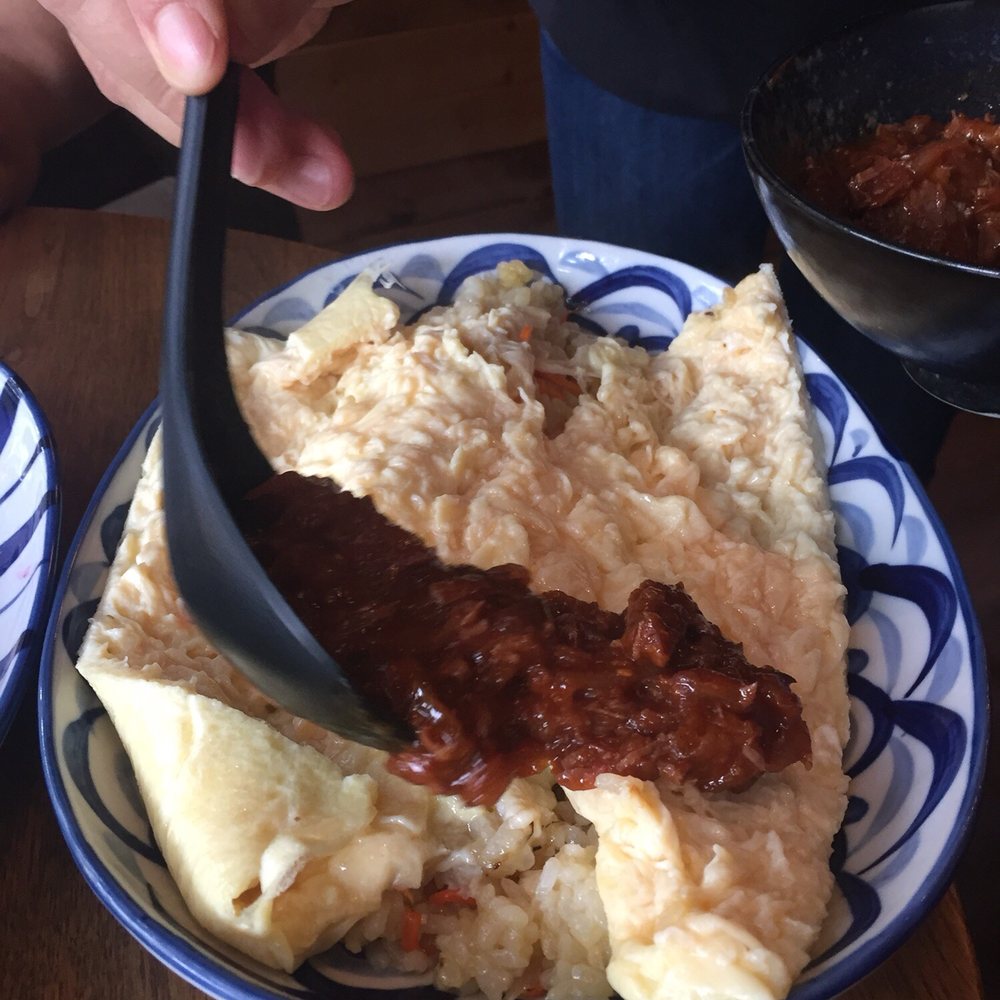 Dosanko - Put the hayashi sauce (beef) on top of the eggs - Japanese Near Me - Vancouver, British Columbia