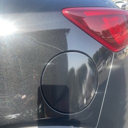 Scratch across gas tank cover Scratch across gas tank cover