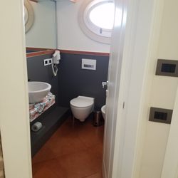 Casa Turrisi - Top-most room: bathroom. Shower is not visible and is located too left of photo.
