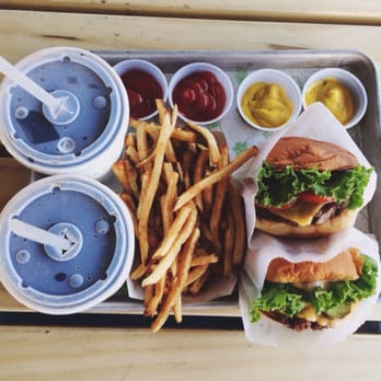 Shake Shack Boca Raton - Two Shack Burgers with fries and drinks - Burgers Near Me - Boca Raton, Florida Shake Shack Boca Raton - Two Shack Burgers with fries and drinks - Burgers Near Me - Boca Raton, Florida