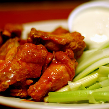 The Cottage - a plate of chicken wings and celery - Bars Near Me - Crystal Lake, Illinois The Cottage - a plate of chicken wings and celery - Bars Near Me - Crystal Lake, Illinois