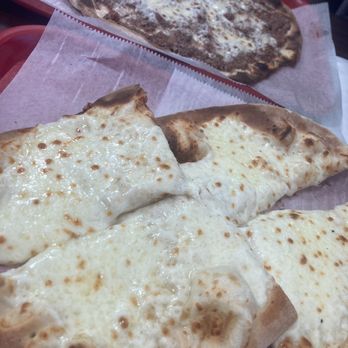 Bash Mansour Bakery - four pieces of cheese pizza - Bakeries Near Me - Dearborn, Michigan