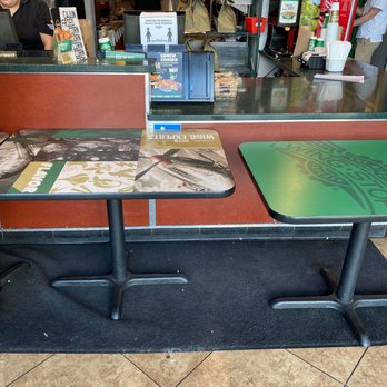 Wingstop - a table with a book on it - Chicken Wings Near Me - Bakersfield, California Wingstop - a table with a book on it - Chicken Wings Near Me - Bakersfield, California