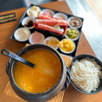 Yunshang Rice Noodle - a bowl of soup and bowls of noodles - Noodles Near Me - Edmonton, Alberta Yunshang Rice Noodle - a bowl of soup and bowls of noodles - Noodles Near Me - Edmonton, Alberta