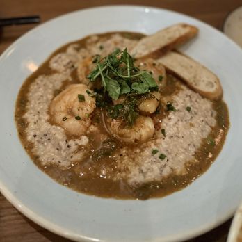 Joyce - Low Country Shrimp & Grits - gulf shrimp, jimmy red grits, roasted peppers, lobster veloute, chives, toast. - Southern Near Me - Los Angeles, California Joyce - Low Country Shrimp & Grits - gulf shrimp, jimmy red grits, roasted peppers, lobster veloute, chives, toast. - Southern Near Me - Los Angeles, California