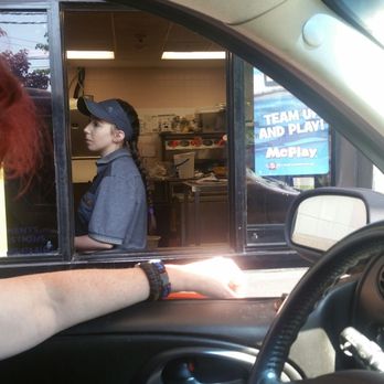 McDonald's - One of their attentive staff expertly handling a technical issue. - Burgers Near Me - Cuba, New York