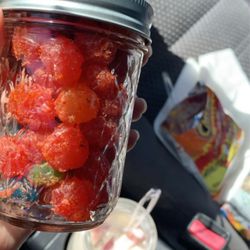 Julies Antojitos Food Truck - Dulces enchilados (spicy candy), Cheetos with cheese, strawberries & cream.