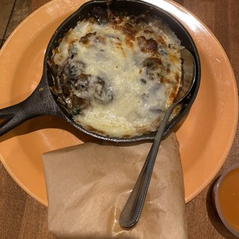 Cocina Madrigal - Oaxaca Fundido:cheese melted, over longaniza sausage, roasted jalapeños, mushrooms, caramelizedonions & epazote, $11.95 - Tacos Near Me - Phoenix, Arizona