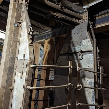 Queen Mine Tours - This is the mine shaft used to bring men and materials from one floor to another. - Tours Near Me - Bisbee, Arizona Queen Mine Tours - This is the mine shaft used to bring men and materials from one floor to another. - Tours Near Me - Bisbee, Arizona