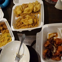 Asian Cuisine Express - Rice, noodles, potatoes, chicken, crab rangoon, an empty bowl and a full tummy.