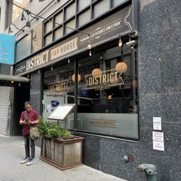 Exterior outside entrance of District Tap House - New York, New York Exterior outside entrance of District Tap House - New York, New York
