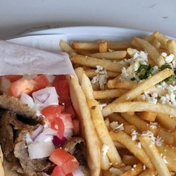 Greek Islands Cuisine - Gyro and fries close up