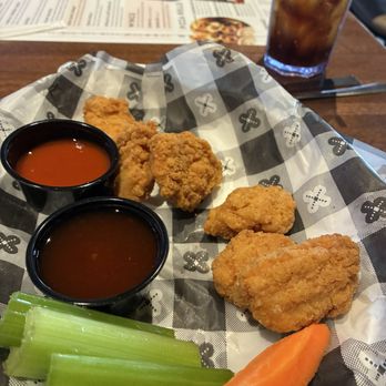 Nebraska Ale Works - Boneless chicken wings with habanero mango sauce, nice heat no overly hot just perfect complement. - Sports Bars Near Me - Kearney, Nebraska Nebraska Ale Works - Boneless chicken wings with habanero mango sauce, nice heat no overly hot just perfect complement. - Sports Bars Near Me - Kearney, Nebraska