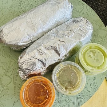 Cristino's Bakery - Asada Burrito with hot, mild green tomato, and avocado salsas - Bakeries Near Me - Goleta, California