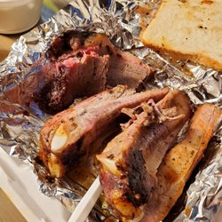 Top Dogg BBQ SmokeHouse - Pork ribs and beef brisket. So tender and so delucious.