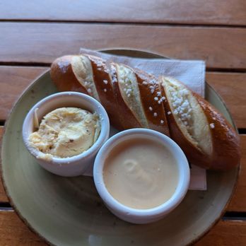 Edison, Craft Ales + Kitchen - pretzel bread with cheese sauce and honey butter - Gastropubs Near Me - Asheville, North Carolina Edison, Craft Ales + Kitchen - pretzel bread with cheese sauce and honey butter - Gastropubs Near Me - Asheville, North Carolina