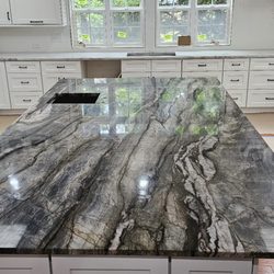 Custom Stone Edge Services - Kitchen Renovation that we were apart of, Tempest Blue Quartzite for the island