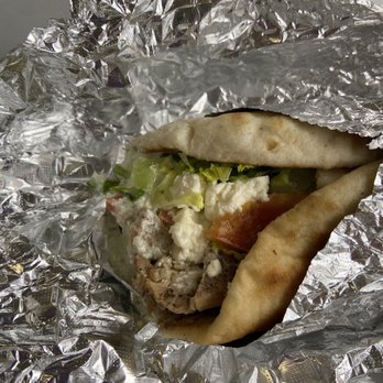 Little Village Grill - Grilled chicken gyro (to go) with feta. Delicious! - Greek Near Me - Charlotte, North Carolina Little Village Grill - Grilled chicken gyro (to go) with feta. Delicious! - Greek Near Me - Charlotte, North Carolina