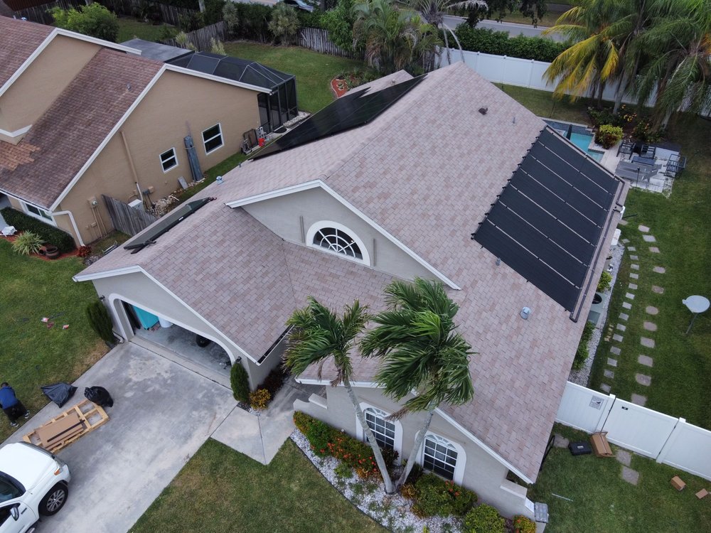 Slide of Gomez Roofing