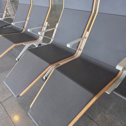 El-Prat Terminal 2 - Clean and comfy half-reclined seating area ...