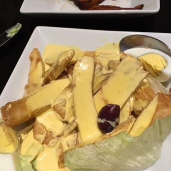 Mamita Peruvian Restaurant - Fried yuca a la huancaina (creamy yellow sauce) very good - Peruvian Near Me - Glendale, California Mamita Peruvian Restaurant - Fried yuca a la huancaina (creamy yellow sauce) very good - Peruvian Near Me - Glendale, California