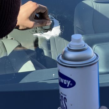 New Auto Glass - Finishing up process; cleaning excess materials - Auto Glass Services Near Me - Burlingame, California New Auto Glass - Finishing up process; cleaning excess materials - Auto Glass Services Near Me - Burlingame, California