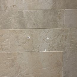 Some unfinished holes in shower stall Some unfinished holes in shower stall
