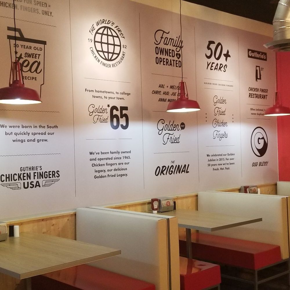 Guthrie's- Tampa - The backroom has mixed seating of hightops and booths. And Yas... extra sauce please! - Fast Food Near Me - Tampa, Florida