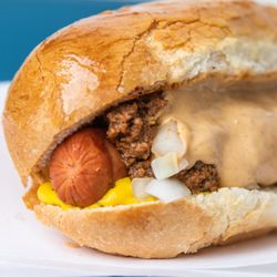 Bill’s Sandwich Palace - CHILI CHZ PUP--Hebrew National all beef hotdog, Szechuan pork chili, onion, yellow mustard, BSP signature cheese wiz