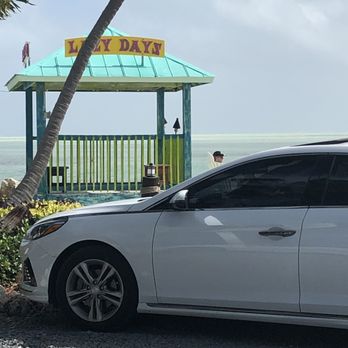 Lazy Days Restaurant - Tiki bar in the beach outside of Lazy Days - Seafood Near Me - Islamorada, Florida Lazy Days Restaurant - Tiki bar in the beach outside of Lazy Days - Seafood Near Me - Islamorada, Florida