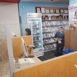 a woman and a man in a pharmacy a woman and a man in a pharmacy