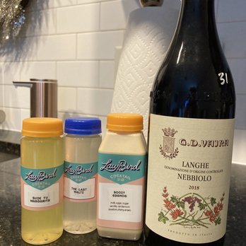 Law Bird - Wine and three of their bottled libations - Wine Bars Near Me - Columbus, Ohio