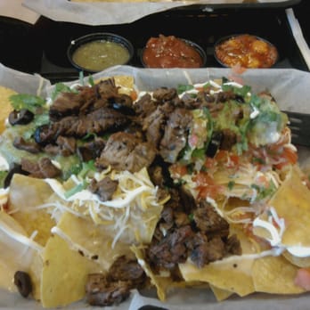 Xochimex Cantina Grill - Steak Nachos w/guac, sour cream, pico de gallo, cheese and queso!!! - Mexican Near Me - Miami, Florida Xochimex Cantina Grill - Steak Nachos w/guac, sour cream, pico de gallo, cheese and queso!!! - Mexican Near Me - Miami, Florida