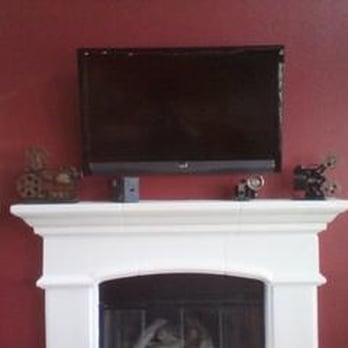 Audio Video Systems - This 46" tv installation has the wires concealed within an interior fireplace. - Home Theatre Installation Near Me Audio Video Systems - This 46" tv installation has the wires concealed within an interior fireplace. - Home Theatre Installation Near Me