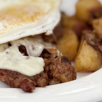 Galley Diner - Eggs over medium with cheese melted on top of fresh hash and a side of home fries!!! - Diners Near Me - South Boston, Massachusetts Galley Diner - Eggs over medium with cheese melted on top of fresh hash and a side of home fries!!! - Diners Near Me - South Boston, Massachusetts