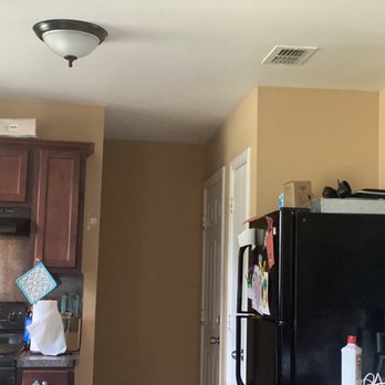 Hocking & Sons Painting - Home was Terra cotta orange, owners went with a light gray. - Painters Near Me
