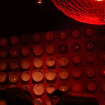 IPPUDO NY - Bowls on the wall. Very nice decor - Ramen Near Me - New York, New York