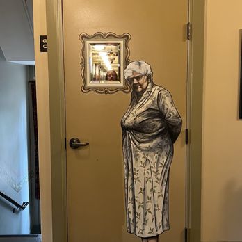 McMenamins Grand Lodge - Portrait of the ghost on the way to the third floor. - Hotels Near Me - Forest Grove, Oregon McMenamins Grand Lodge - Portrait of the ghost on the way to the third floor. - Hotels Near Me - Forest Grove, Oregon