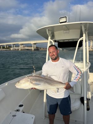 Big redfish on a half day inshore at Sebastian Inlet - This half-day inshore fishing trip is priced at $500 for up to 4 people, and an additional 100$ per person with space for a maximum of 6 guests. Trips depart in the morning at 6:00 AM or in the afternoon at 1:00 PM, giving you flexibility to fit your schedule. Fishing focuses on popular local species such as Snook, Redfish, Trout, Snapper, Tarpon, Mackerel, Sheepshead, Flounder, Black Drum, Goliath Grouper, and Shark, depending on conditions. This trip is well suited for families, beginners, and casual anglers looking for a relaxed inshore experience with hands-on guidance. All bait, rods, and gear are included, along with fish cleaning, ice, and bottled water. Deposits are refundable within 72 hours (Trips & Rates Page) Big redfish on a half day inshore at Sebastian Inlet - This half-day inshore fishing trip is priced at $500 for up to 4 people, and an additional 100$ per person with space for a maximum of 6 guests. Trips depart in the morning at 6:00 AM or in the afternoon at 1:00 PM, giving you flexibility to fit your schedule. Fishing focuses on popular local species such as Snook, Redfish, Trout, Snapper, Tarpon, Mackerel, Sheepshead, Flounder, Black Drum, Goliath Grouper, and Shark, depending on conditions. This trip is well suited for families, beginners, and casual anglers looking for a relaxed inshore experience with hands-on guidance. All bait, rods, and gear are included, along with fish cleaning, ice, and bottled water. Deposits are refundable within 72 hours (Trips & Rates Page)